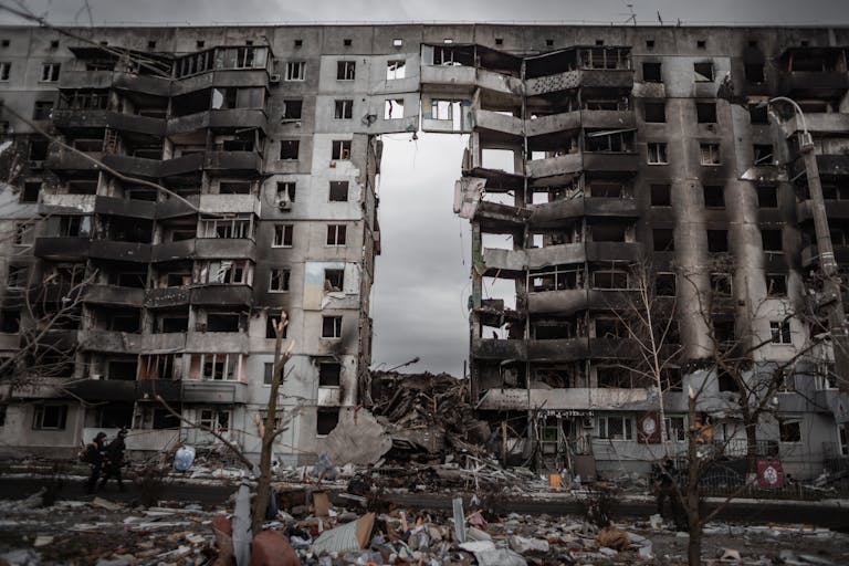 A destroyed apartment building in Borodyanka, Ukraine, showing aftermath of conflict.